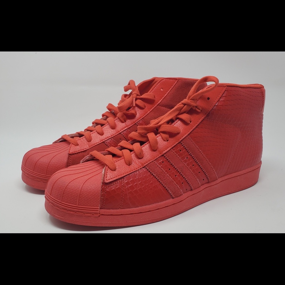 Shell toe,red adidas high tops
